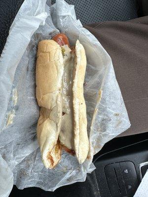 Short dog with brown mustard and relish.  Good snap.