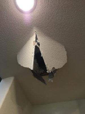 Customers foot through ceiling