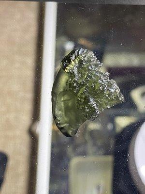 Professionally carved Moldavite piece