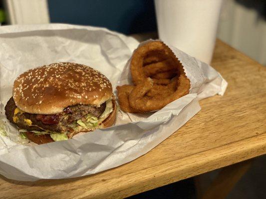 #1 combo; Double Bacon Cheeseburger with onion rings and a large Diet Pepsi.