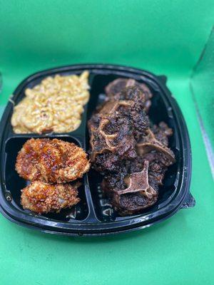 Big bussa, oxtails , jumbo shrimp and Mac!