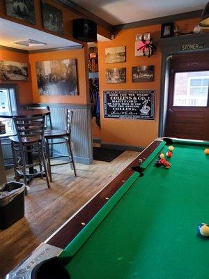 Pool table and historic sign