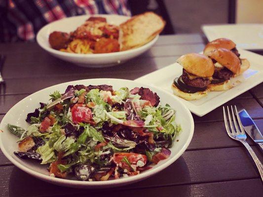 Steak and blue salad, cheeseburger sliders and fettuccine and smoked meatballs