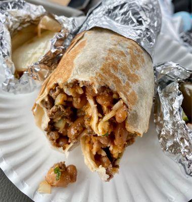 Carne asada regular burrito with spicy salsa ! Maybe too hot for some, but I love it !