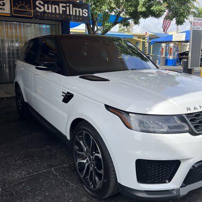 Range Rover in the shop for windshield tint removal and replacement with our highest grade ceramic film!