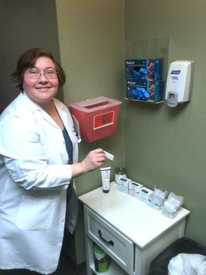 Dr. Stackpole preparing needles in exam suite.