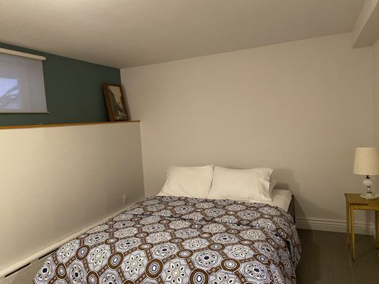 Second bedroom with queen bed and single bed