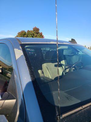 passenger side "A" pillar
  and above the windshield