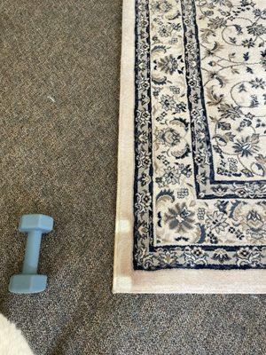 Discoloured rug after cleaning