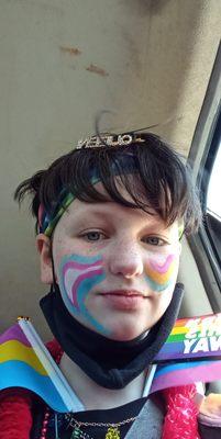 This is a picture of me, the tutor. As you can see I have the trans and pans flag painted on my face.