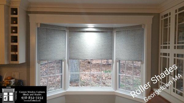 Custom made motorized Roller shades enhancing, and finishing this lovley Kitchen nook!