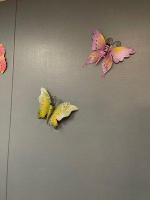 Cute butterflies on the wall in one of the rooms.