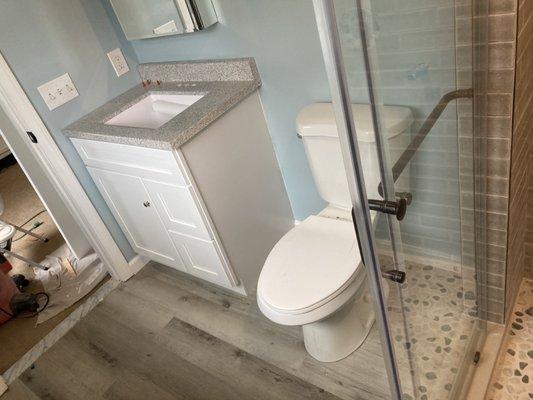 After/before bathroom remodel with tile shower.