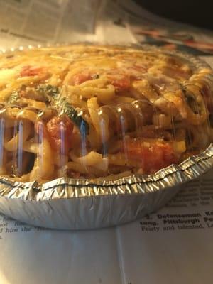 Pasta with tomatoes, garlic, basil and parm smashed into a small container.