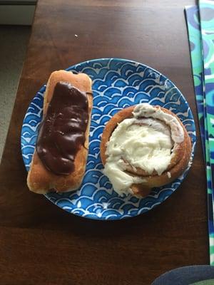 Yummy frosted cinnamon roll and custard long john. Breakfast of champions!!