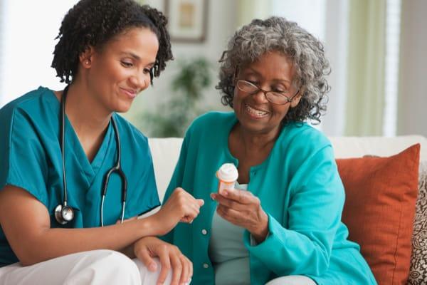 Home Health Care Aide Providing Senior Care