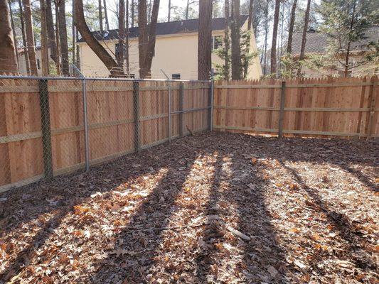 5 point WRC privacy wood with 6'+barbwire backup for pump station