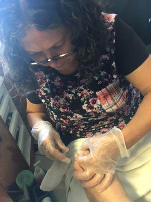 Nail Technician, Maria AKA "Lupita" hard at work... I know her as my momma... tee hee hee.