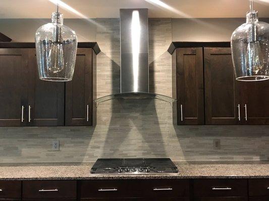 Kitchen Backsplash inspired by the natural elegance of stone looks stunning in this kitchen. The client is very happy with the result!