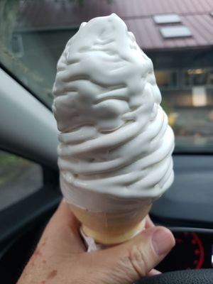 Medium vanilla soft serve cone.