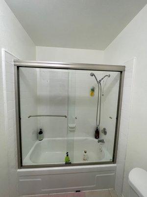 Installed a new sliding glass door in bathroom.