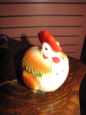 Imagine this rooster sitting next to the 1950's stove where a house wife dropped spare change saving her mad money.