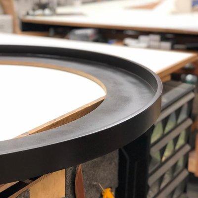 Handcrafted round frames that perfectly complement your unique artwork.