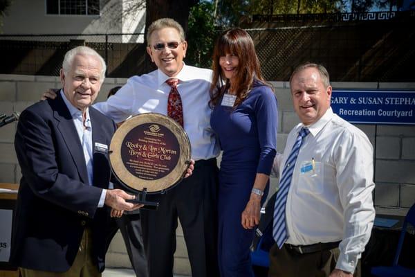 Our founder and CEO honoring Rocky & Lon Morton's dedication to the Boys & Girls Club.