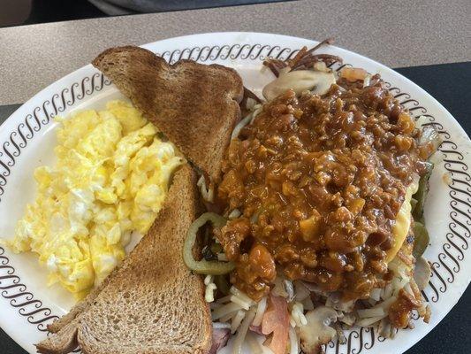 Grilled Chicken w/scrambled eggs and hash browns all the way minus gravy.