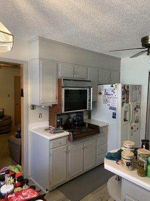 Kitchen cabinets done  Walls  Baseboards  Window  1 door  Semi gloss on walls and door and baseboards