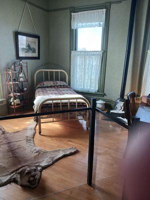 They rented rooms to teachers at the Normal School. That rug is an original but super creepy.