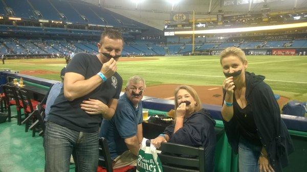 UCF staff and families at Tropicana Field watching the Tampa Bay Rays