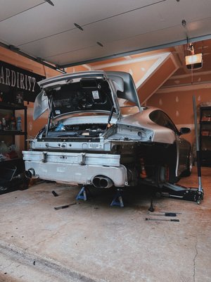 Kevin doing spark plugs and coil packs on my 911