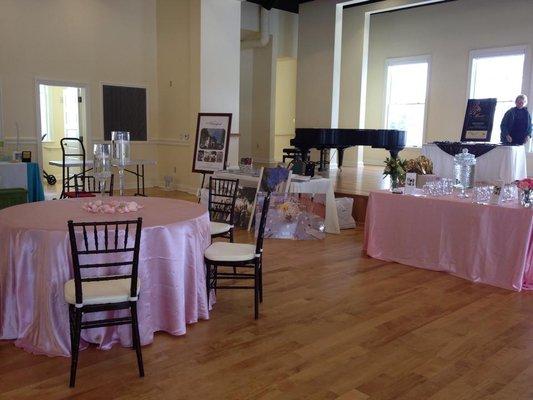 Chivari Chairs, Folding Tables and Pink Satin Linens provided by Loudoun Event Rentals