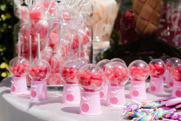 Mini gum ball machines were the perfect party favor for this baby shower.