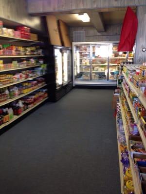 Looking back at the refrigerated and frozen section.