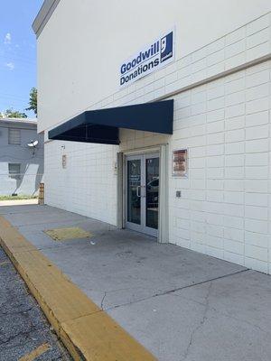 Donations door on side of building