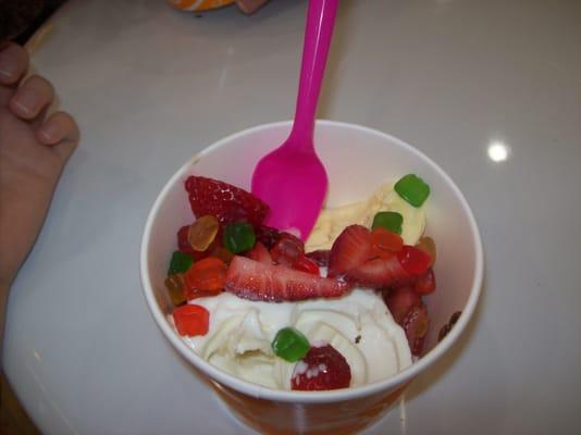 Cheesecake and pineapple froyo with fresh strawberries and Gummi Bears