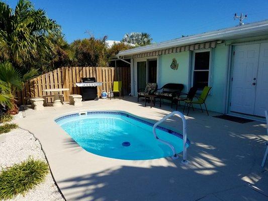 View of the Pool, 38' Dock, Patio Furniture, gas grill and 18x10 Sun Setter Auto Retractable Awning.