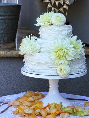 Our 3 tier ruffle wedding cake-2 tiers of Funfetti cake & 1 with yellow cake & vanilla buttercream!