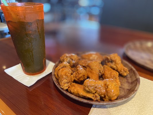 10 wings, breaded in hot sauce.