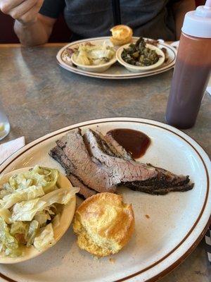 Brisket and smothered cabbage with corn muffin