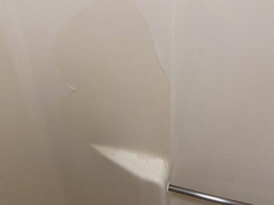 The shower and tub falling apart and paint splinting