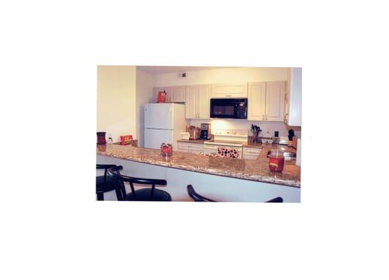 Installed new cabinets and  new counter top.
We just took a ordinary kitchen and beautified it.