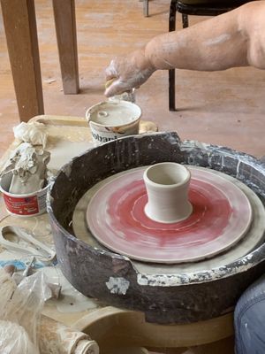 Working on the pottery wheel...