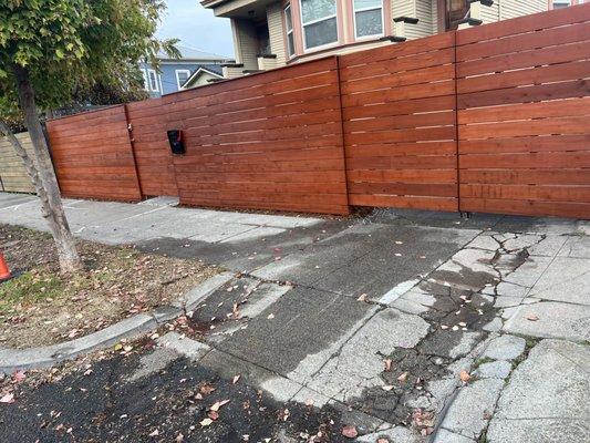 custom fence with natural stain