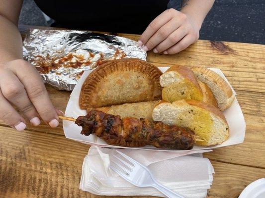 My beautiful Gigi's fingers glazed in bbq sauce, a chicken pincho, beef empanadas and garlic