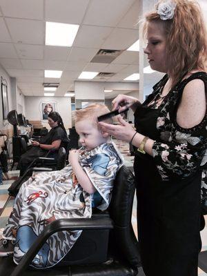 Manager Katrina cutting my 2.5yr olds hair into a Fohawk. Nice Job! She used a size 2 btw.