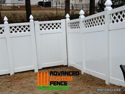 white vinyl fence