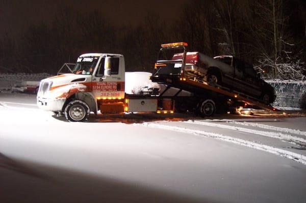 This is our tow truck out in the snow.